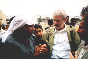 Fr. Woods with Iraqi citizens in 2001